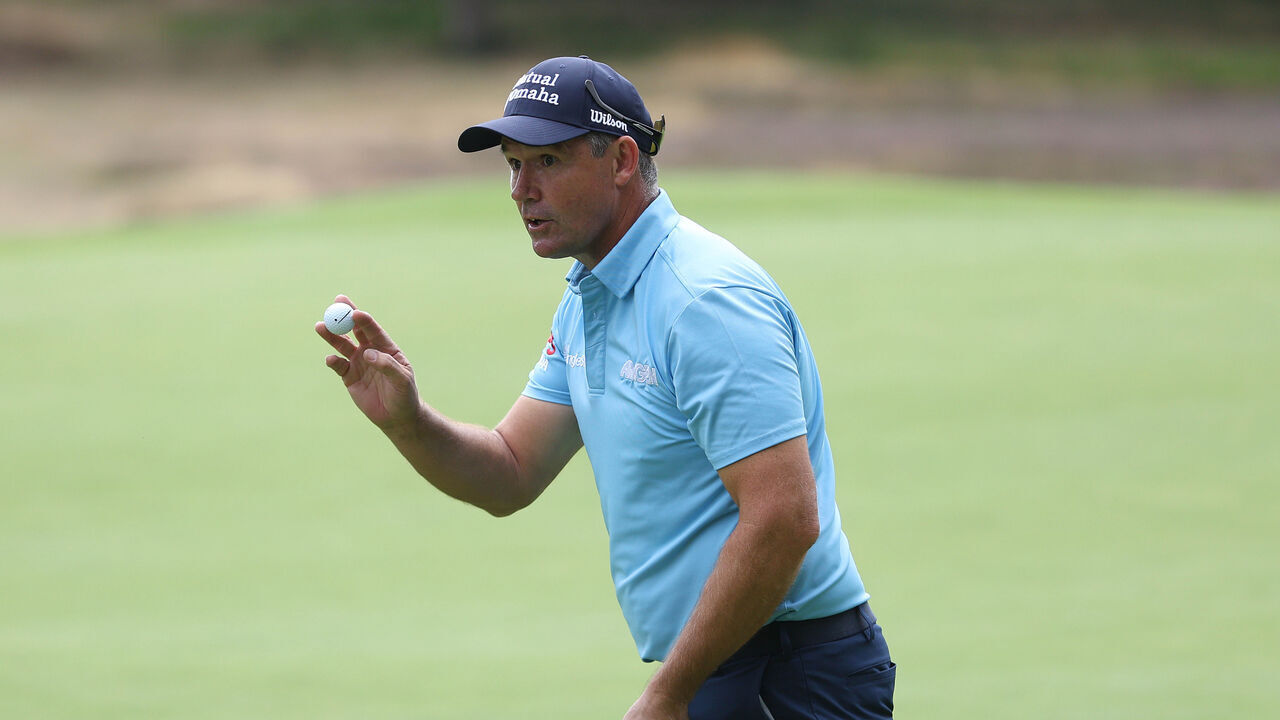 SUNNINGDALE, ENGLAND - JULY 26: Padraig Harrington of Ireland acknowledges the crowd in celebration after making a birdie on the 4th hole during the third round of the ISPS HANDA Senior Open 2025 at Sunningdale Golf Club on July 26, 2025 in Sunningdale, England.