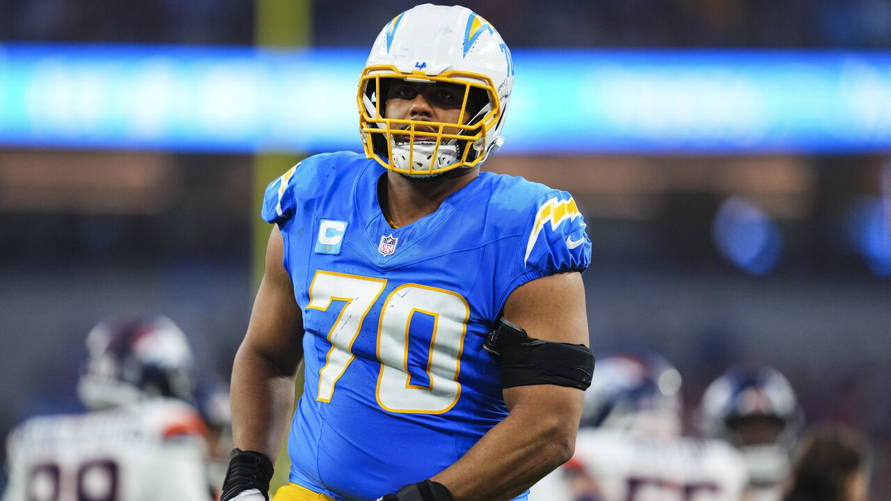 INGLEWOOD, CA - DECEMBER 19: Rashawn Slater #70 of the Los Angeles Chargers looks on from the field during an NFL football game against the Denver Broncos at SoFi Stadium on December 19, 2024 in Inglewood, California.