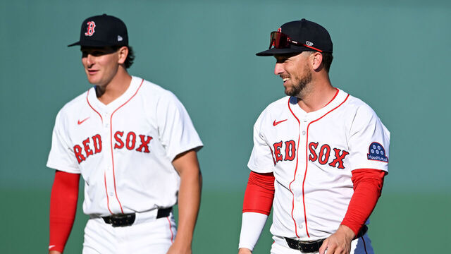 FORT MYERS, FLORIDA - MARCH 12: Roman Anthony #48 and Alex Bregman #2 of the Boston Red Sox warm up prior to a spring training game against the Minnesota Twins at JetBlue Park at Fenway South on March 12, 2025 in Fort Myers, Florida.