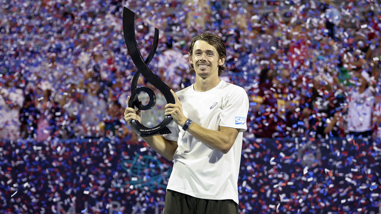 WASHINGTON, DC - JULY 27: Alex De Minaur of Australia poses with the men's singles championship trophy after winning the men's singles finals match against Alejandro Davidovich Fokina of Spain on the final day of the Mubadala Citi DC Open 2025 at William H.G. FitzGerald Tennis Center on July 27, 2025 in Washington, DC.
