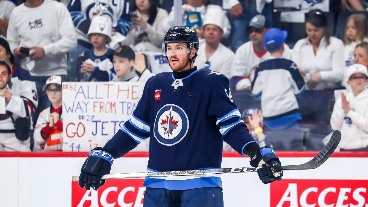 WINNIPEG, CANADA - MAY 9: Dylan Samberg #54 of the Winnipeg Jets looks on during the pre-game warm up prior to NHL action against the Dallas Stars in Game Two of the Second Round of the 2025 Stanley Cup Playoffs at the Canada Life Centre on May 9, 2025 in Winnipeg, Manitoba, Canada.