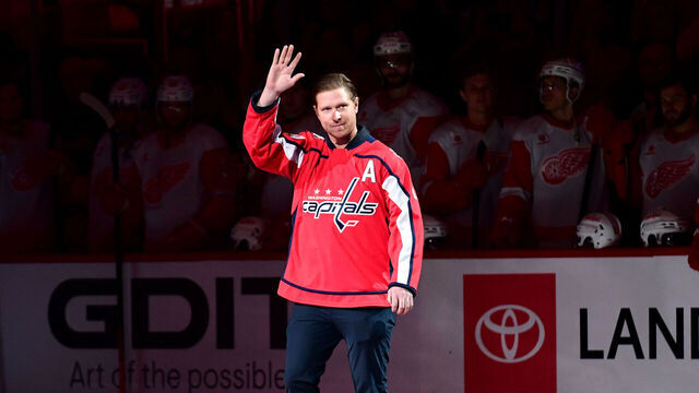 WASHINGTON, DC - MARCH 07: Former Capital Nicklas Backstrom waves to the crowd during a pregame ceremony before the Detroit Red Wings versus Washington Capitals National Hockey League game on March 7, 2025 at Capital One Arena in Washington, D.C..