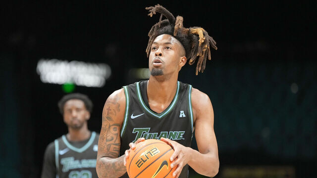 LAS VEGAS, NV - APRIL 01: Gregg Glenn III #2 of the Tulane Green Wave lakes a foul shot during the 1st round of the Crown College Basketball Championship against the USC Trojans at the MGM Garden Arena on April 01, 2025 in Las Vegas, Nevada.