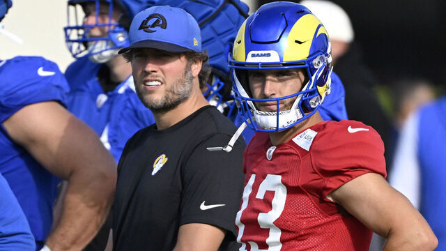 Los Angeles, CA - July 29: Quarterback Matthew Stafford, left, with quarterback Stetson Bennett (13) of the Los Angeles Rams during the Los Angele Rams training camp on the campus of Loyola Marymount University in Los Angeles on Tuesday, July 29, 2025.