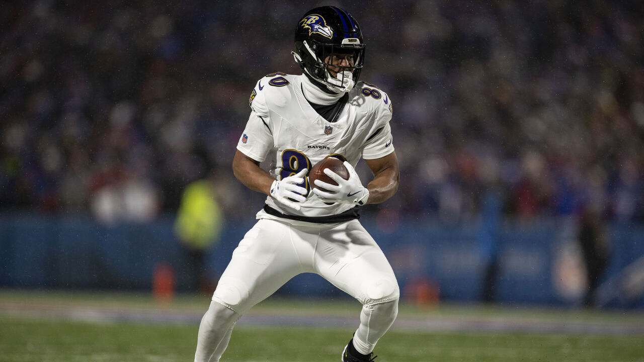 ORCHARD PARK, NEW YORK - JANUARY 19: Isaiah Likely #80 of the Baltimore Ravens runs with the ball during an NFL Football game against the Buffalo Bills at Highmark Stadium on January 19, 2025 in Orchard Park, New York.