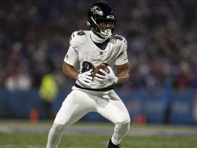 ORCHARD PARK, NEW YORK - JANUARY 19: Isaiah Likely #80 of the Baltimore Ravens runs with the ball during an NFL Football game against the Buffalo Bills at Highmark Stadium on January 19, 2025 in Orchard Park, New York.