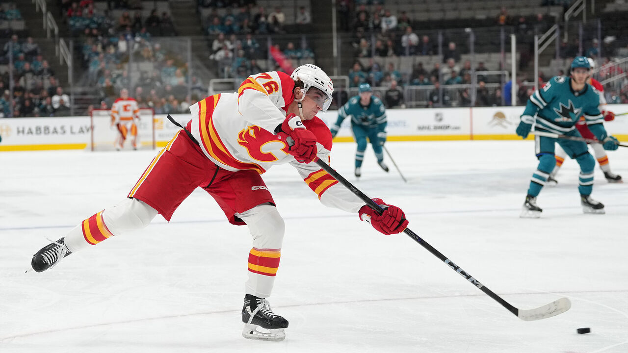 SAN JOSE, CALIFORNIA - APRIL 07: Martin Pospisil #76 of the Calgary Flames shoots on goal against the San Jose Sharks during the first period of an NHL hockey game at SAP Center on April 07, 2025 in San Jose, California.