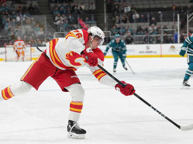 SAN JOSE, CALIFORNIA - APRIL 07: Martin Pospisil #76 of the Calgary Flames shoots on goal against the San Jose Sharks during the first period of an NHL hockey game at SAP Center on April 07, 2025 in San Jose, California.