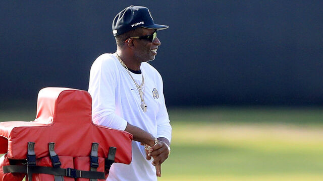 TAMPA, FL - JULY 23: University of Colorado Head Coach Deion Sanders watches the Buccaneers go thru a drill during Training Camp on July 23, 2025 at the AdventHealth Training Center at One Buccaneer Place in Tampa, Florida.
