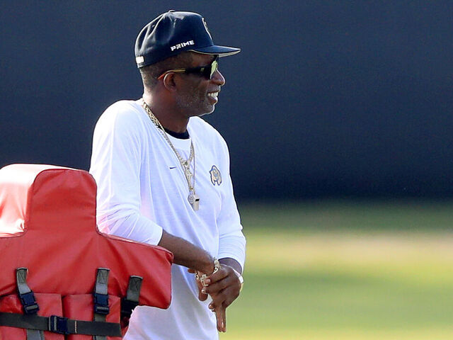 TAMPA, FL - JULY 23: University of Colorado Head Coach Deion Sanders watches the Buccaneers go thru a drill during Training Camp on July 23, 2025 at the AdventHealth Training Center at One Buccaneer Place in Tampa, Florida.