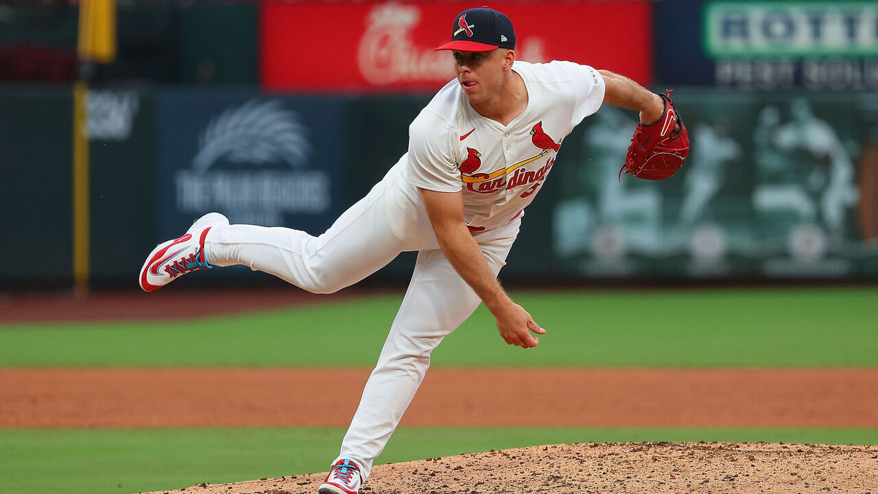 ST LOUIS, MISSOURI - JULY 13: Ryan Helsley #56 of the St. Louis Cardinals delivers a pitch against the Atlanta Braves in the ninth inning at Busch Stadium on July 13, 2025 in St Louis, Missouri.