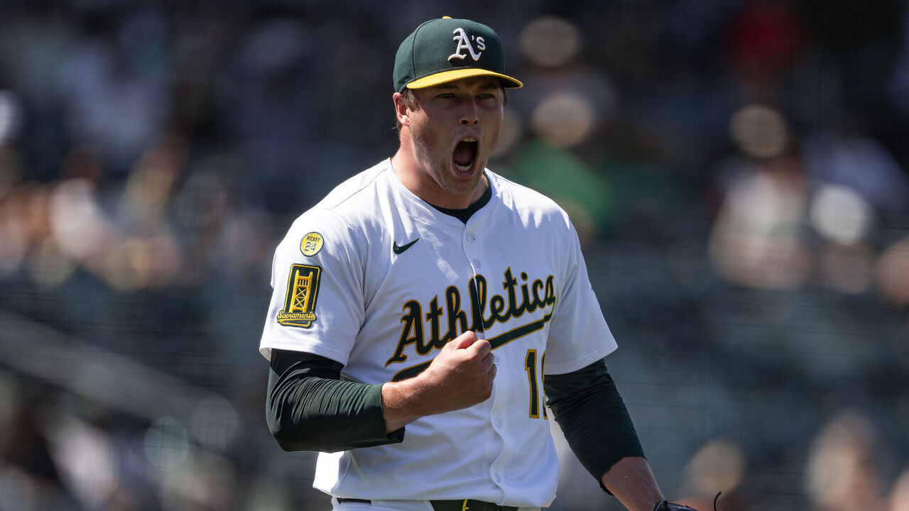 SACRAMENTO, CALIFORNIA - JULY 13: Mason Miller #19 of the Athletics reacts after getting Vladimir Guerrero Jr. to ground into a double play to defeat the Toronto Blue Jays 6-3 and pick up his 19th save of the season at Sutter Health Park on July 13, 2025 in Sacramento, California.