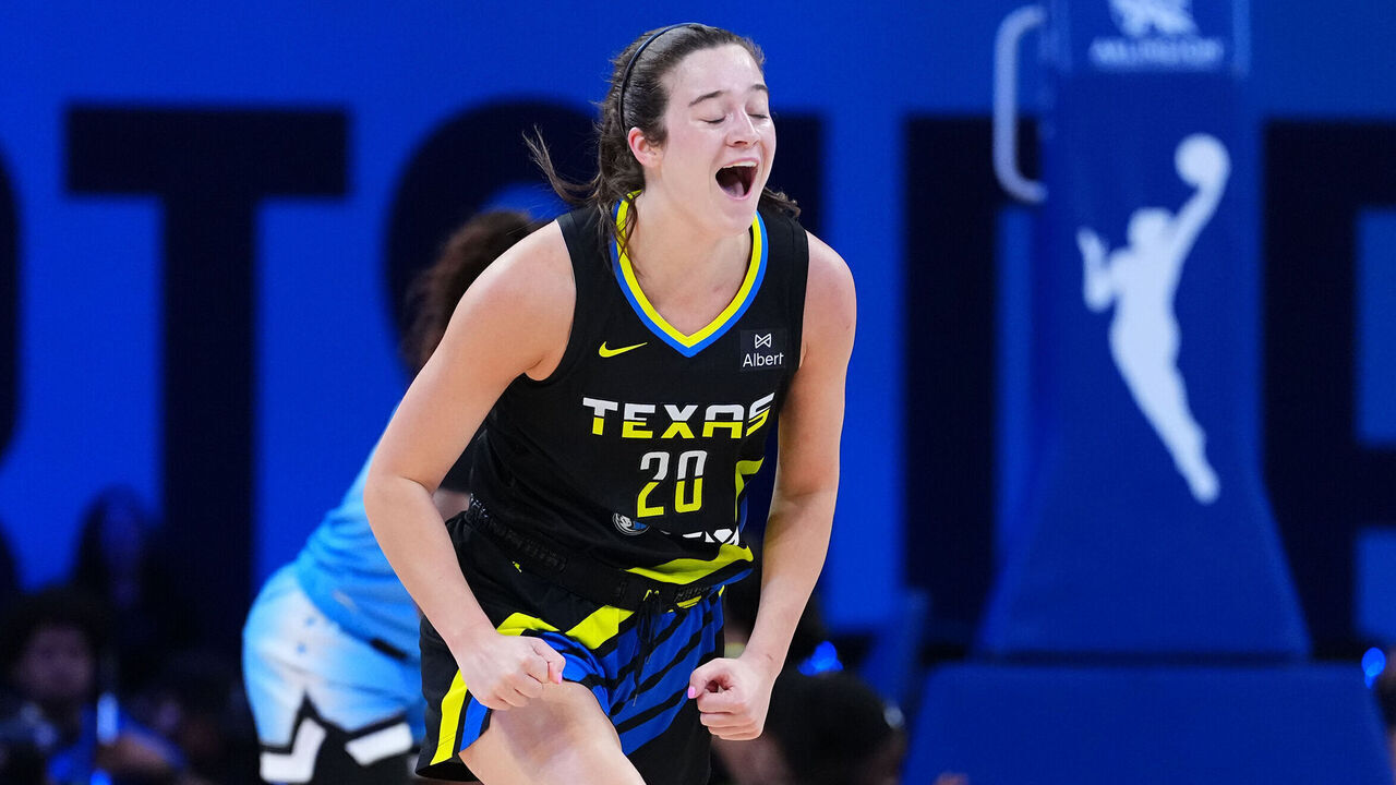 ARLINGTON, TX - MAY 31: Maddy Siegrist #20 of the Dallas Wings celebrates during the game against the Chicago Sky on May 31, 2025 at the College Park Center in Arlington, TX. Mandatory Copyright Notice: Copyright 2025 NBAE