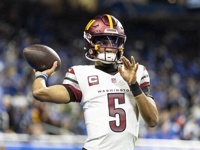 DETROIT, MICHIGAN - JANUARY 18: Jayden Daniels #5 of the Washington Commanders looks to pass prior to an NFL Football game against the Detroit Lions at Ford Field on January 18, 2025 in Detroit, Michigan.