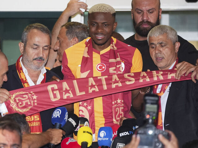 ISTANBUL, TURKIYE - JULY 30: Nigerian footballer Victor Osimhen, whose transfer talks with Galatasaray have begun, arrives at Ataturk Airport's General Aviation Terminal by private jet, where club officials and numerous fans welcome the 26-year-old player in Istanbul, Turkiye, on July 30, 2025.