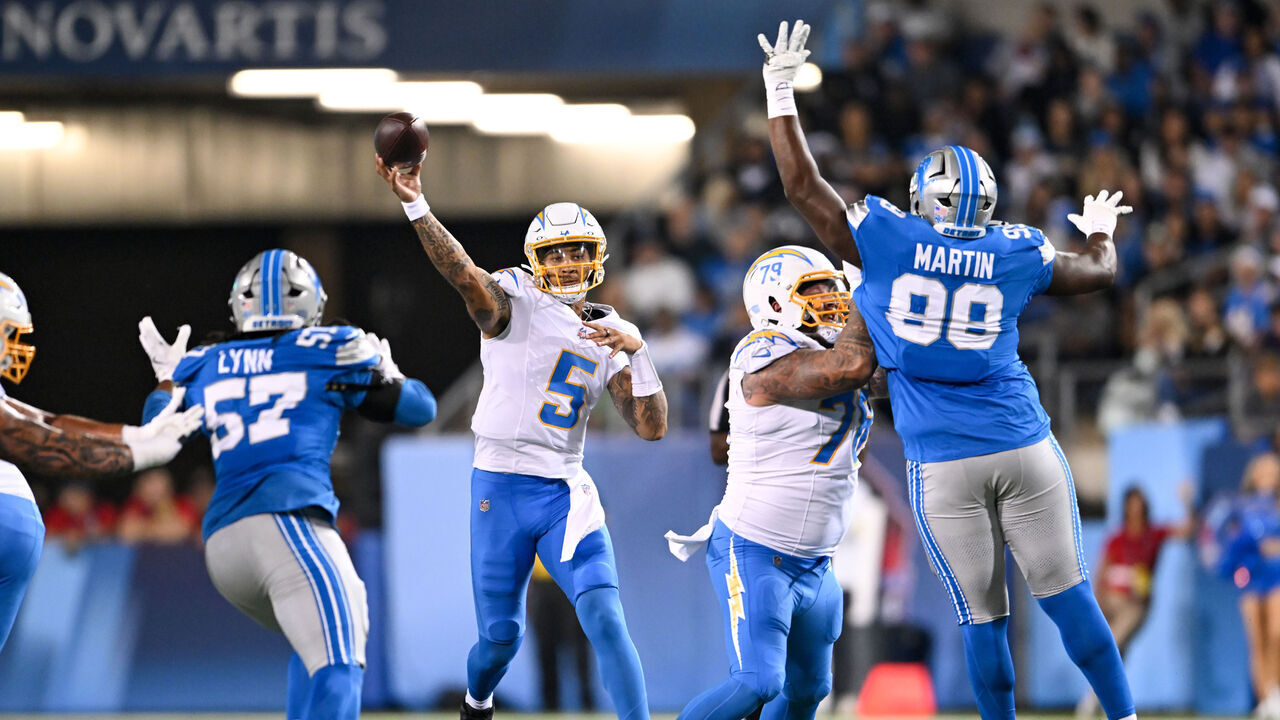 CANTON, OHIO - JULY 31: Trey Lance #5 of the Los Angeles Chargers throws a pass during the second quarter of the 2025 Pro Football Hall of Fame Game against the Detroit Lions at Tom Benson Hall of Fame Stadium on July 31, 2025 in Canton, Ohio.