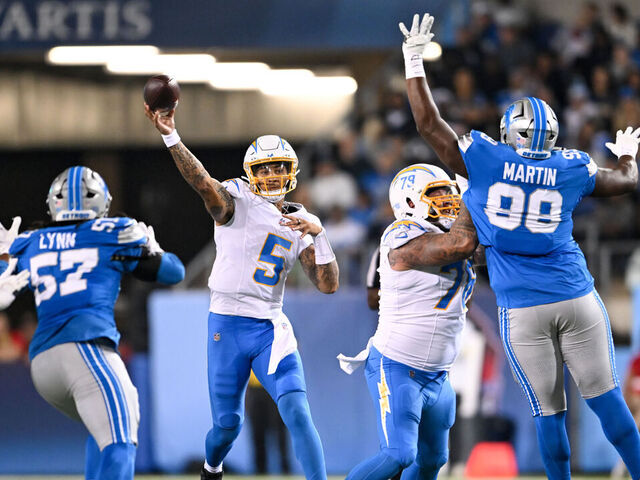 CANTON, OHIO - JULY 31: Trey Lance #5 of the Los Angeles Chargers throws a pass during the second quarter of the 2025 Pro Football Hall of Fame Game against the Detroit Lions at Tom Benson Hall of Fame Stadium on July 31, 2025 in Canton, Ohio.