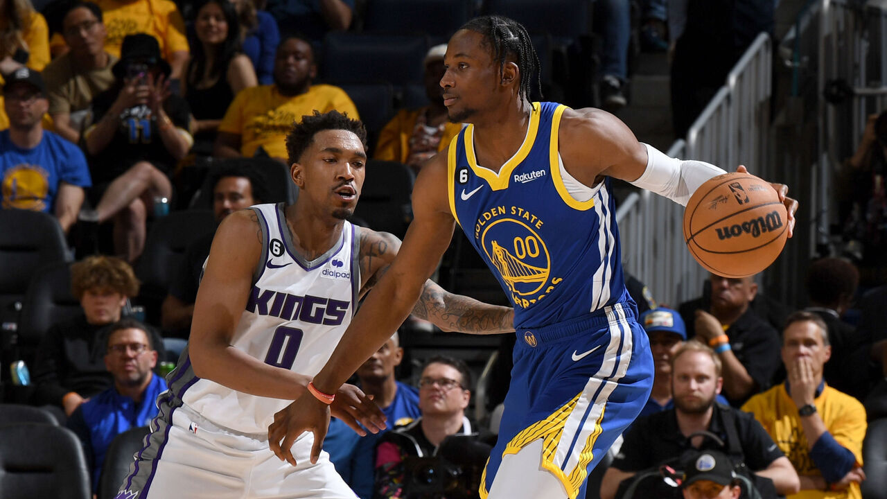 SAN FRANCISCO, CA - APRIL 28: Jonathan Kuminga #00 of the Golden State Warriors dribbles the ball during the game against the Sacramento Kings during Round 1 Game 6 of the 2023 NBA Playoffs on April 28, 2023 at Chase Center in San Francisco, California. NOTE TO USER: User expressly acknowledges and agrees that, by downloading and or using this photograph, user is consenting to the terms and conditions of Getty Images License Agreement. Mandatory Copyright Notice: Copyright 2023 NBAE