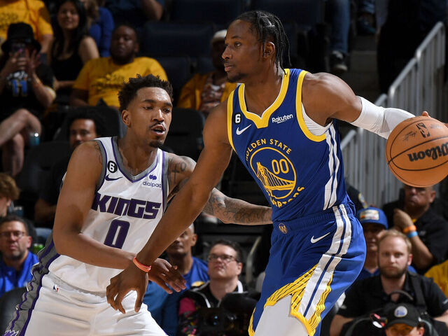 SAN FRANCISCO, CA - APRIL 28: Jonathan Kuminga #00 of the Golden State Warriors dribbles the ball during the game against the Sacramento Kings during Round 1 Game 6 of the 2023 NBA Playoffs on April 28, 2023 at Chase Center in San Francisco, California. NOTE TO USER: User expressly acknowledges and agrees that, by downloading and or using this photograph, user is consenting to the terms and conditions of Getty Images License Agreement. Mandatory Copyright Notice: Copyright 2023 NBAE