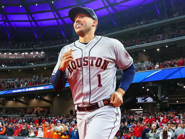 ATLANTA, GA - OCTOBER 29: Carlos Correa, #1 of the Houston Astros runs out before Game 3 of the 2021 World Series between the Houston Astros and the Atlanta Braves at Truist Park on Friday, October 29, 2021 in Atlanta, Georgia.