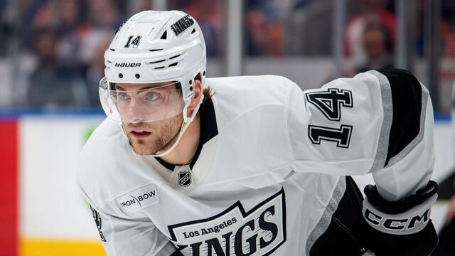 EDMONTON, CANADA - APRIL 14: Alex Laferriere #14 of the Los Angeles Kings awaits a face-off during the game against the Edmonton Oilers at Rogers Place on April 14, 2025, in Edmonton, Alberta, Canada.