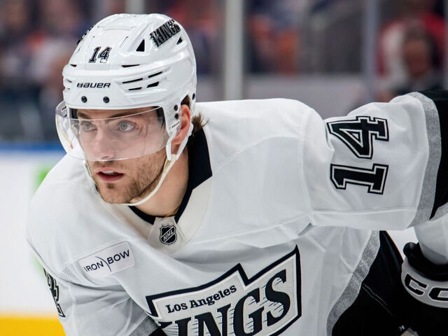 EDMONTON, CANADA - APRIL 14: Alex Laferriere #14 of the Los Angeles Kings awaits a face-off during the game against the Edmonton Oilers at Rogers Place on April 14, 2025, in Edmonton, Alberta, Canada.