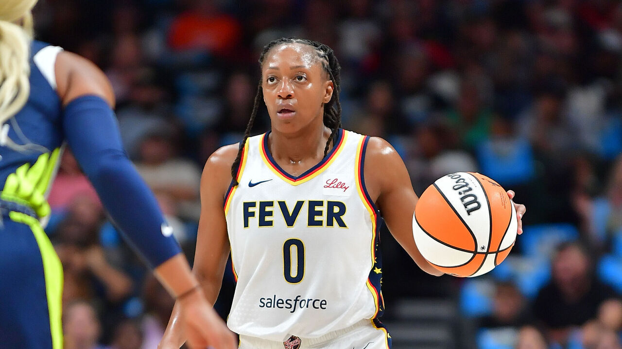 DALLAS, TX - AUGUST 1: Kelsey Mitchell #0 of the Indiana Fever dribbles the ball during the game against the Dallas Wings on August 1, 2025 at the American Airlines Center in Dallas, TX. Mandatory Copyright Notice: Copyright 2025 NBAE