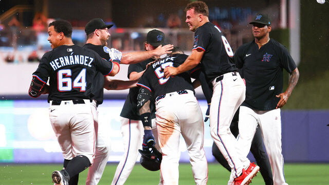 MIAMI, FLORIDA - AUGUST 01: Agustín Ramírez #50 of the Miami Marlins celebrates with teammates after walking it off to defeat the New York Yankees at loanDepot park on August 01, 2025 in Miami, Florida.