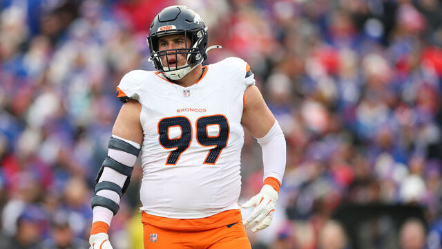 ORCHARD PARK, NEW YORK - JANUARY 12: Zach Allen #99 of the Denver Broncos reacts after a sack against the Buffalo Bills in the second quarter during the AFC Wild Card Playoffs at Highmark Stadium on January 12, 2025 in Orchard Park, New York.