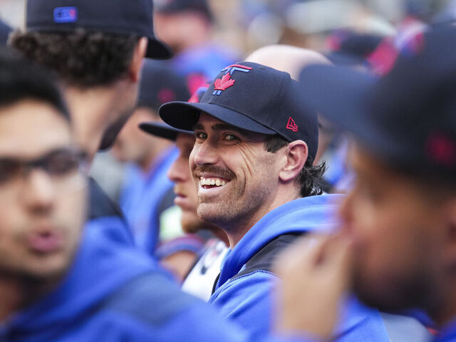 TORONTO, ON - AUGUST 1: Shane Bieber #57 of the Toronto Blue Jays looks on from the dugout ahead of play against the Kansas City Royals in their MLB game at the Rogers Centre on August 1, 2025 in Toronto, Ontario, Canada.