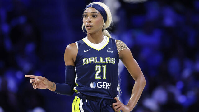 ARLINGTON, TEXAS - JULY 30: DiJonai Carrington #21 of the Dallas Wings looks on against the Atlanta Dream during the game at College Park Center on July 30, 2025 in Arlington, Texas. NOTE TO USER: User expressly acknowledges and agrees that, by downloading and/or using this photograph, user is consenting to the terms and conditions of the Getty Images License Agreement.
