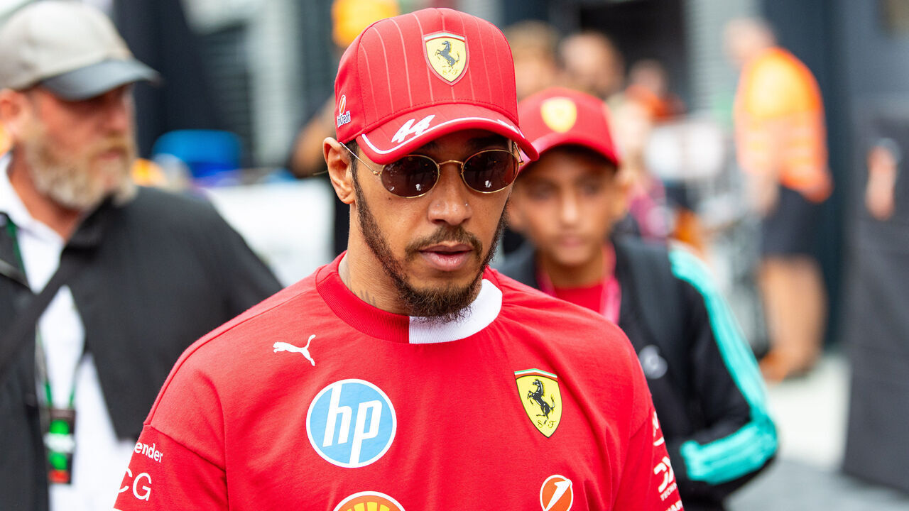 BUDAPEST, HUNGARY - AUGUST 3: Lewis Hamilton of Great Britain and Ferrari walks in the paddock during the F1 Grand Prix of Hungary at Hungaroring on August 3, 2025 in Budapest, Hungary.