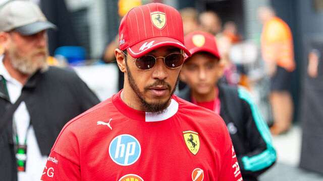 BUDAPEST, HUNGARY - AUGUST 3: Lewis Hamilton of Great Britain and Ferrari walks in the paddock during the F1 Grand Prix of Hungary at Hungaroring on August 3, 2025 in Budapest, Hungary.