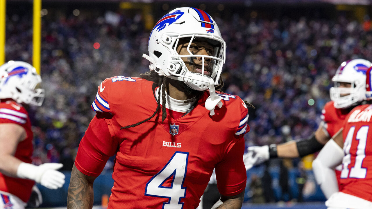 ORCHARD PARK, NEW YORK - DECEMBER 22: James Cook #4 of the Buffalo Bills celebrates after scoring a touchdown in the second quarter of the game against the New England Patriots at Highmark Stadium on December 22, 2024 in Orchard Park, New York. The Bills beat the Patriots 24-21.