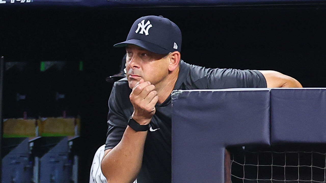 BRONX, NY - JULY 25: Aaron Boone #17 of the New York Yankees in the dugout during the game against the Philadelphia Phillies on July 25, 2025 at Yankee Stadium in the Bronx, New York.