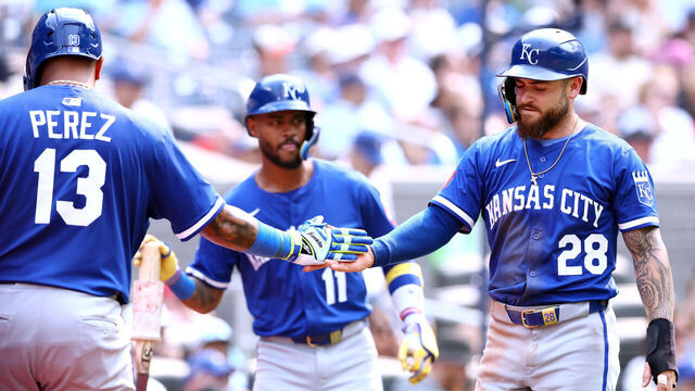 TORONTO, ON - AUGUST 03: Kyle Isbel #28 of the Kansas City Royals celebrates scoring a run with Salvador Perez #13 on a single by Tyler Tolbert #2 in the tenth inning during a game against the Toronto Blue Jays at Rogers Centre on August 03, 2025 in Toronto, Ontario, Canada.