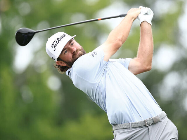GREENSBORO, NORTH CAROLINA - AUGUST 03: Cameron Young of the United States plays his shot from the 11th tee during the final round of the Wyndham Championship 2025 at Sedgefield Country Club on August 03, 2025 in Greensboro, North Carolina.