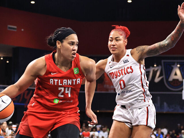 ATLANTA, GA - AUGUST 3: Brionna Jones #24 of the Atlanta Dream handles the ball during the game as Shakira Austin #0 of the Washington Mystics defends on August 3, 2025 at Gateway Center Arena at College Park in Atlanta, Georgia. Mandatory Copyright Notice: Copyright 2025 NBAE