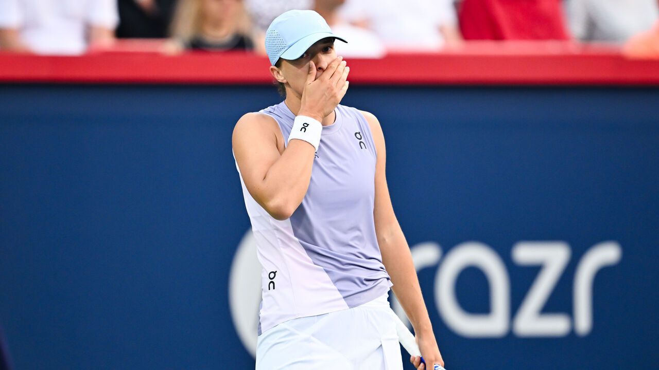 MONTREAL, CANADA - AUGUST 03: Iga Swiatek of Poland reacts after giving up a point in the second set against Clara Tauson of Denmark during their fourth round singles women's match on Day Eight of the WTA 1000 National Bank Open at IGA Stadium on August 3, 2025 in Montreal, Quebec, Canada.