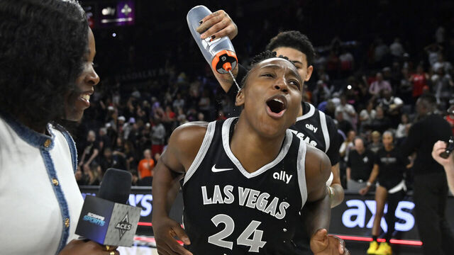LAS VEGAS, NV - AUGUST 3: Kierstan Bell #1 pours water on Jewell Loyd #24 of the Las Vegas Aces after the game against the Golden State Valkyries on August 3, 2025 at Michelob ULTRA Arena in Las Vegas, Nevada. Mandatory Copyright Notice: Copyright 2025 NBAE