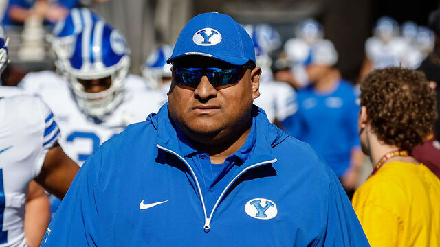 TEMPE, AZ - NOVEMBER 23: Brigham Young Cougars head coach Kalani Sitake looks on before the college football game between the BYU Cougars and the Arizona State Sun Devils on November 23, 2024 at Mountain America Stadium in Tempe, Arizona.