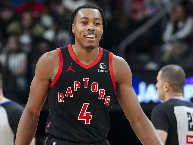 TORONTO, CANADA - FEBRUARY 23: Scottie Barnes #4 of the Toronto Raptors smiles during a NBA game against the Phoenix Suns at Scotiabank Arena on February 23, 2025 in Toronto, Canada.
