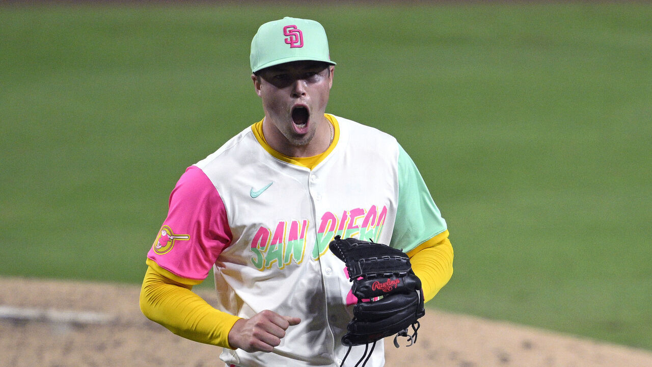 SAN DIEGO, CALIFORNIA - AUGUST 01: Mason Miller #22 of the San Diego Padres reacts after pitching against the St. Louis Cardinals during the eighth inning at Petco Park on August 01, 2025 in San Diego, California.