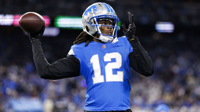 DETROIT, MICHIGAN - JANUARY 18: Quarterback Teddy Bridgewater #12 of the Detroit Lions warms up during an NFL football divisional playoff game against the Washington Commanders, at Ford Field on January 18, 2025 in Detroit, Michigan.