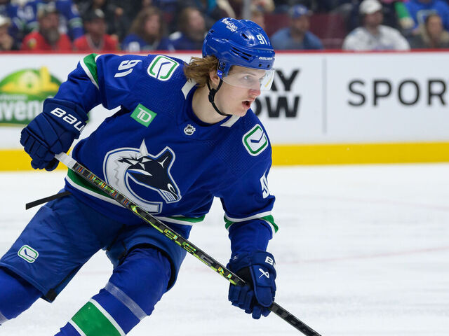 VANCOUVER, CANADA - APRIL 6: Vitali Kravtsov #91 of the Vancouver Canucks skates up ice during the second period of their NHL game against the Chicago Blackhawks at Rogers Arena on April 6, 2023 in Vancouver, British Columbia, Canada.
