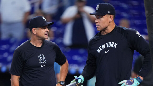 MIAMI, FLORIDA - AUGUST 02: New York Yankees manager Aaron Boone and Aaron Judge #99 look on during batting practice prior to a game against the Miami Marlins at loanDepot park on August 02, 2025 in Miami, Florida.