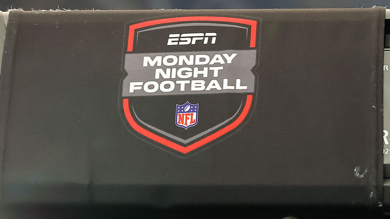 GLENDALE, AZ - JANUARY 13: The ESPN Monday Night Football logo on a camera before the NFL Wild Card Playoff football game between the Minnesota Vikings and the Los Angeles Rams on January 13, 2025, at State Farm Stadium in Glendale, AZ.