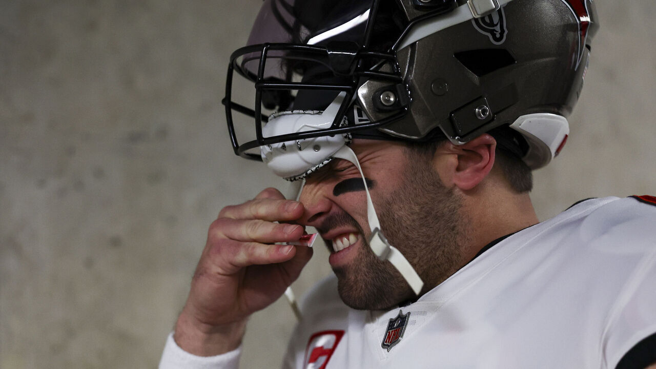 DETROIT, MI - JANUARY 21: Baker Mayfield #6 of the Tampa Bay Buccaneers sniffs smelling salts in the tunnel prior to an NFL divisional round playoff football game against the Detroit Lions at Ford Field on January 21, 2024 in Detroit, Michigan.