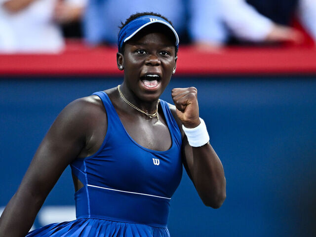 MONTREAL, CANADA - AUGUST 06: Victoria Mboko of Canada celebrates as she wins the second set against Elena Rybakina of Kazakhstan during their semifinal singles women's match on Day Eleven of the WTA 1000 National Bank Open at IGA Stadium on August 6, 2025 in Montreal, Quebec, Canada.