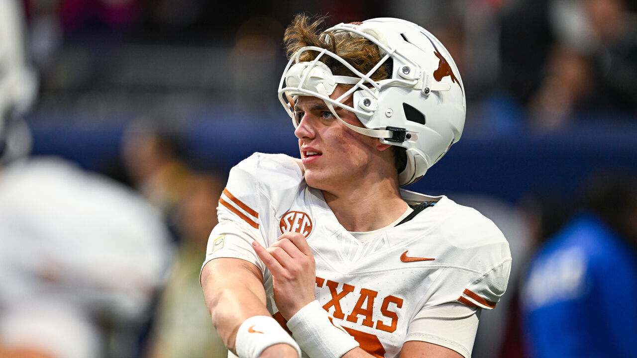 ATLANTA, GA DECEMBER 07: Texas quarterback Arch Manning (16) warms up prior to the start of the SEC Championship game between the Texas Longhorns and the Georgia Bulldogs on December 7th, 2024 at Mercedes-Benz Stadium in Atlanta, GA.